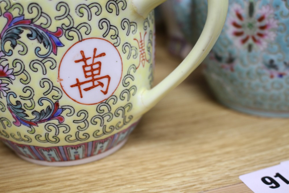 Three Chinese blue and white prunus pattern ginger jars, two other jars and ten assorted teapots